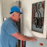 See It All Owner Robert Allen doing an electrical inspection